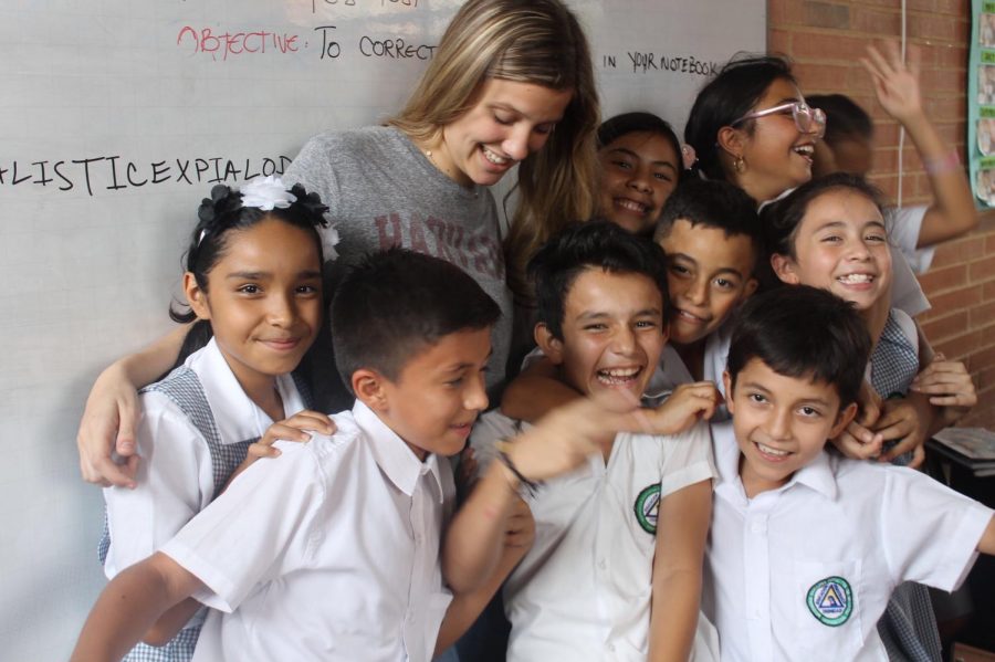 Erwich is pictured here with a group of the young children she met in Columbia. 