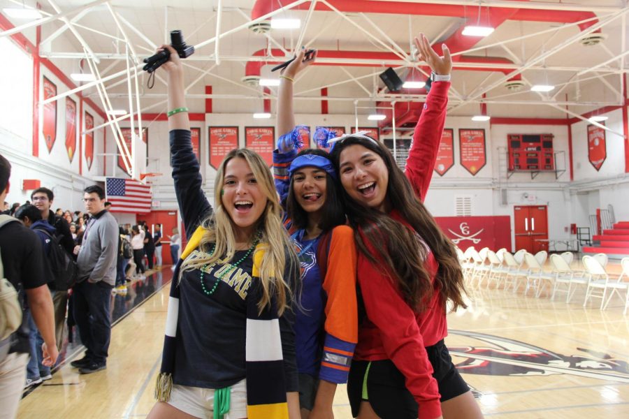 Seniors sporting their new college gear and celebrating their admission. 