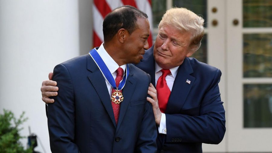 Woods is awarded the Presidential Medal of Freedom after overcoming an 11-year period of losses.