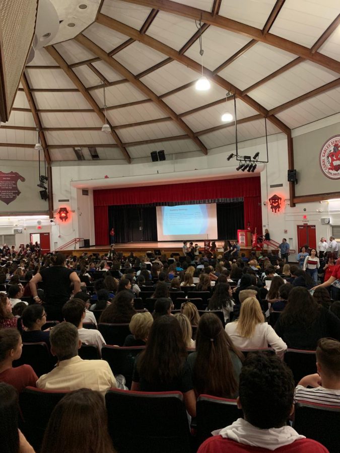 The+2023+class+listens+as+Principal+Costa+gives+his+remarks.