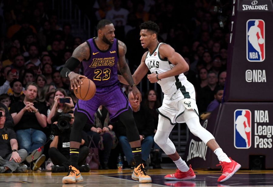 LeBron+James+%28left%29+of+the+Los+Angeles+Lakers+backs+down+Giannis+Antetokounmpo+%28right%29+of+the+Milwaukee+Bucks