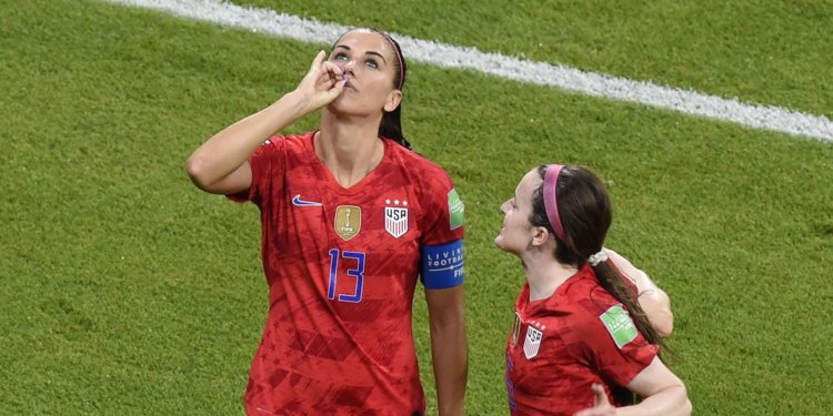 Alex Morgan mimics sipping tea after a goal-scoring header in the England vs America world cup match on July 7. 