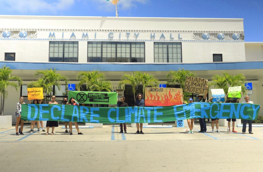 Students gather to protest in front of Miami City Hall. 