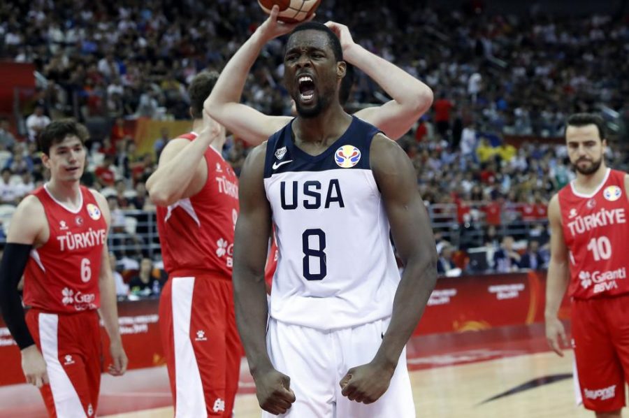 Harrison Barnes pridefully celebrates after an emphatic dunk against Turkey.