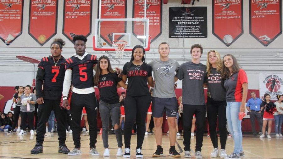 Fall Sports team captains at the alma mater pep rally.