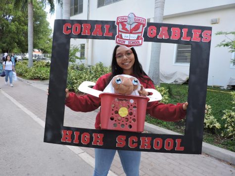 Senior Isabella Quintanilla poses for a picture with a Cavalier picture frame during Spirit Week.