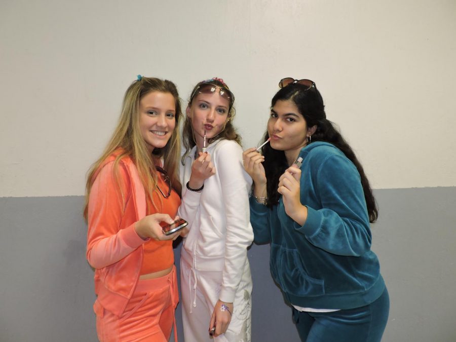 Students pose in their Blast from the Past outfits,
