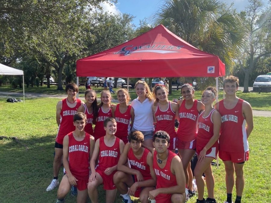 The Coral Gables Cross Country team posing in front of their new tent
