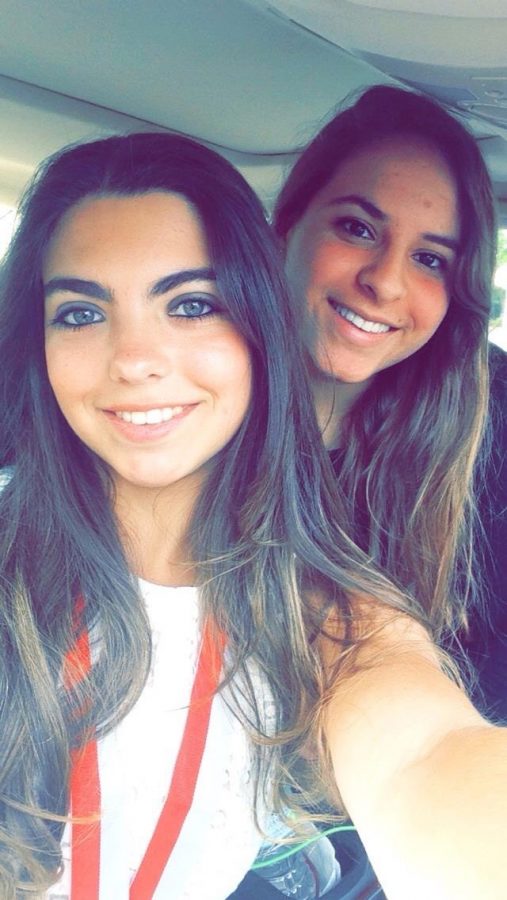 Andrea Jaime and her best friend, Priscilla Rodriguez, pose for a selfie. 