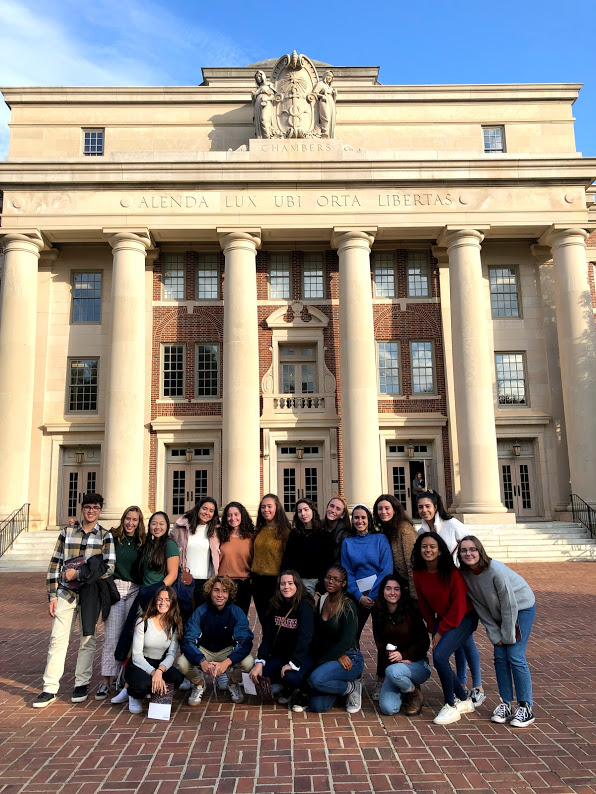 The+2019+college+tour+group+poses+for+a+photo+outside+of+a+library+at+Davidson+College+in+North+Carolina.+