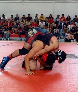 The Gables wrestlers competed against other players on the team to train for a future tournament.