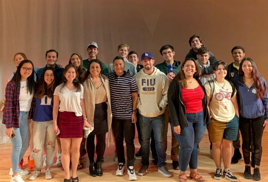 C.A.P. Advisor Ms. Driver poses for a picture with her former seniors, now college freshmen, after the 2019 College Forum.