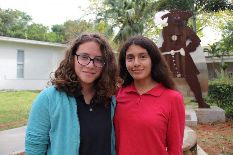 The newest additions to the Cavalier Wrestling team are bringing the fiercest competition. Victoria Benedetti (left), Giovanna Flores (right) and Sara Richards are the first females ever to participate in the sport of wrestling at Coral Gables. 