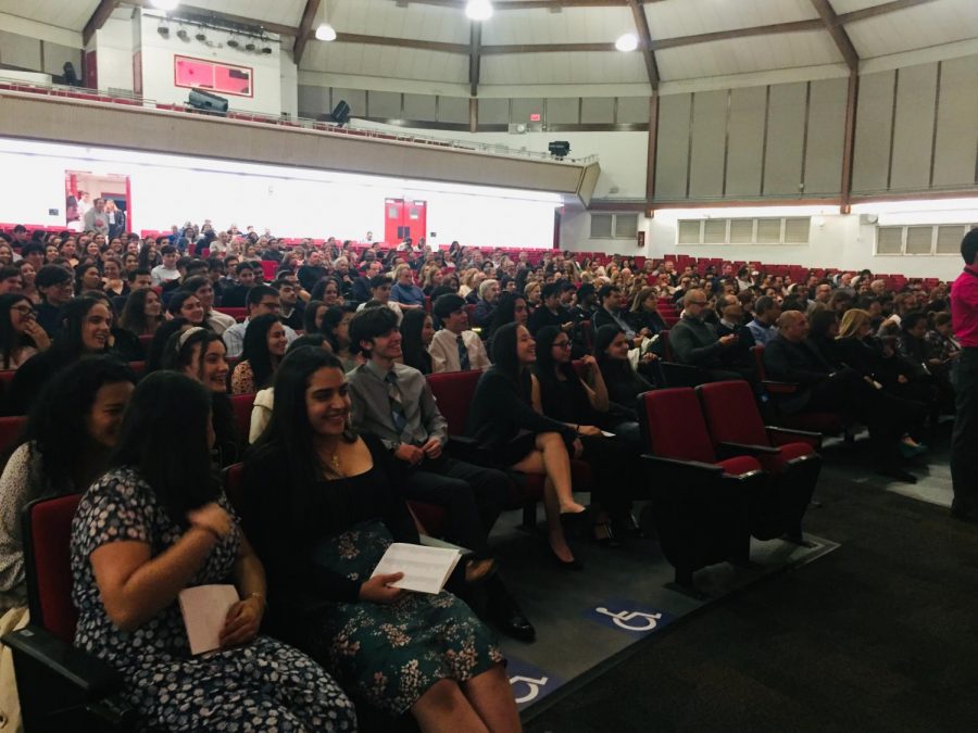 The junior class awaiting to receive their IB pin. 