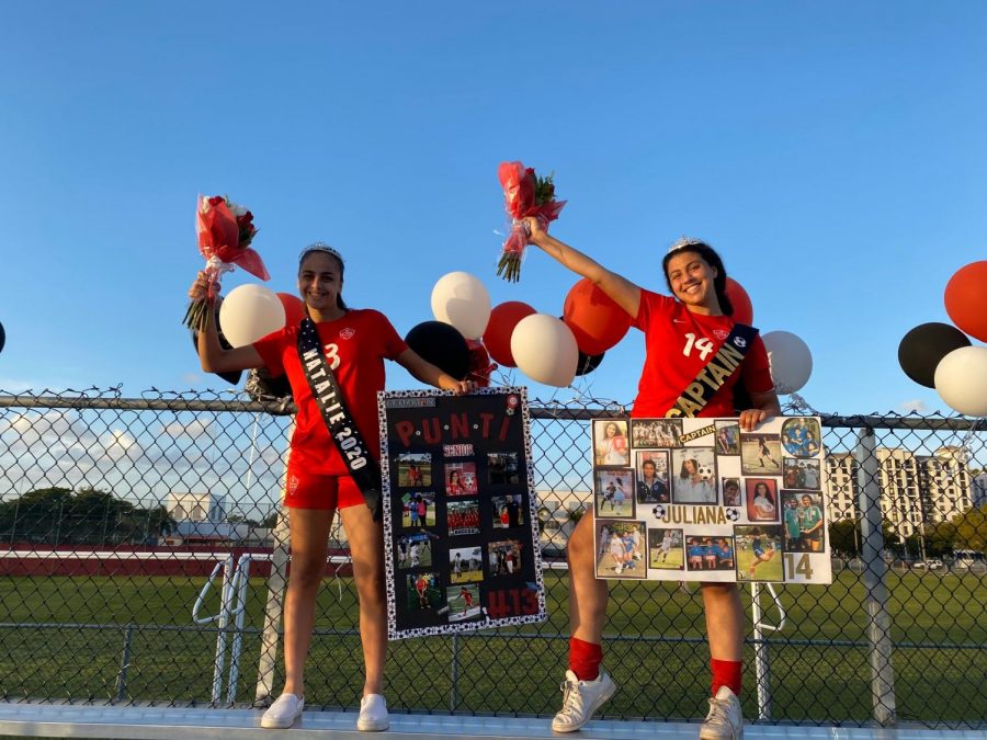 Captains+Natalie+Puntonet+and+Juliana+Bonavita%2C+in+addition+to+the+four+other+seniors+on+the+Lady+Cavalier+soccer+team+celebrate+their+last+home+game+with+posters%2C+crowns%2C+sashes+and+undying+support+from+their+teammates%2C+friends+and+family.+