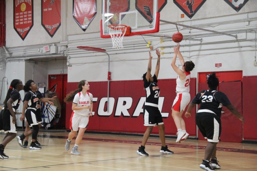 Senior Isabella Pinera swiftly shot a jump shot against the Miami Carol City Senior High School Chiefs.