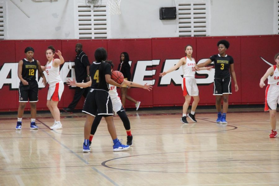 The Lady Cavaliers getting serious with their defense, guarding the Bulls man-to-man to create as many turnovers as possible.