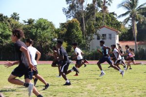 During an intense workout on the field, the track and field members sprint and test their competitiveness to improve for their meet on Saturday. 