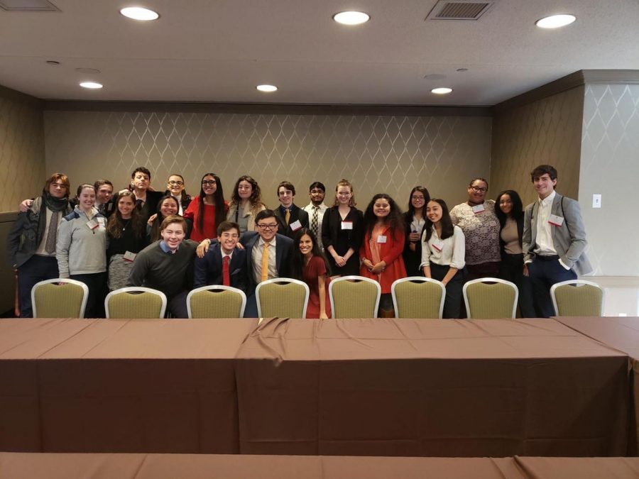 Juniors Sofia Rebull and Aya Hamza join their Committee on Natural Resources, Energy and Commerce for a group photo.