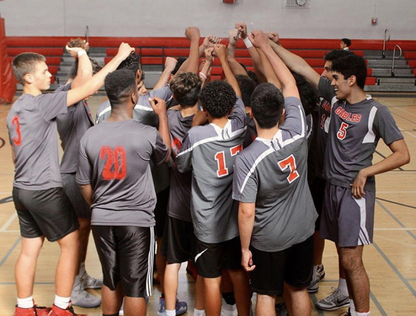 On Mar. 2, in the Coral Gables High school gym, the Cavalier Volleyball team banded together to devise their plan of attack against the International Studies Charter High school. 