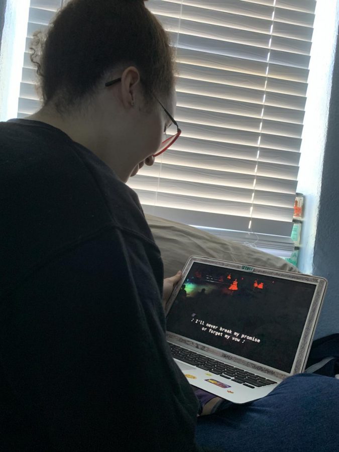 Senior Denise Cuevas binge-watches "Glee" in her bedroom while in quarantine. 