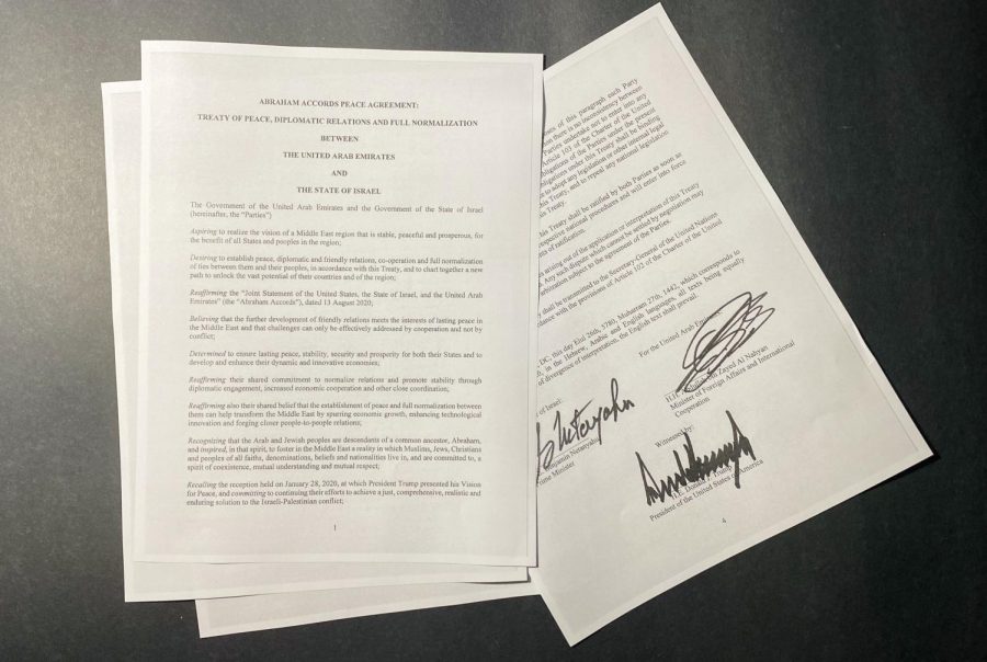 Picture of the "Abraham Accords Peace Agreement" depicting the signatures of the diplomats. Including Prime Minister Benjamin Netanyahu, Adullah bin Zayed Al Nahyan, and President Donald Trump.