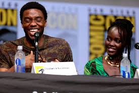 Boseman is pictured smiling with one of his co-stars, Lupita Nyongo, at the San Diego Comic-Con, before his sudden passing shocked fans.