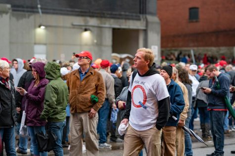 QAnon believer found in Trump rally crowd.