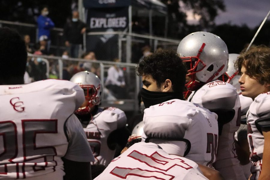 Junior Defensive Linemen David Kuper huddles with his teammates to discuss their next move. 