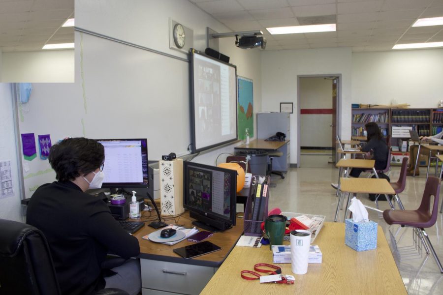 English teacher Ms. Zaldivar manages to create unity between her online and in-person students by projecting the virtual students onto a Promethean board during class discussions. 