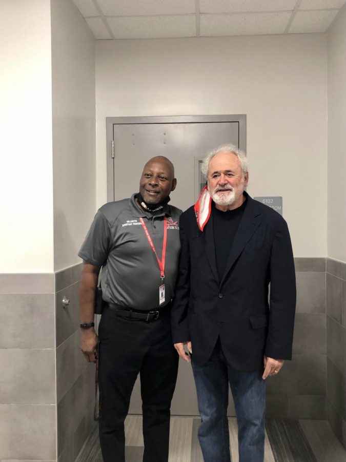 Mr. Curtis, assistant principal and overseer of school conduction, and Mr.Grossman proudly stand in the soon-to-be "Building 6" of the school. 