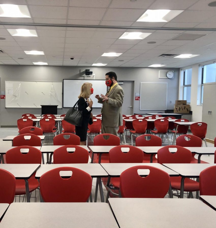 Mari Tere Rojas and Mr.Ullivarri converse in the middle of a brand new classroom on the second floor. 