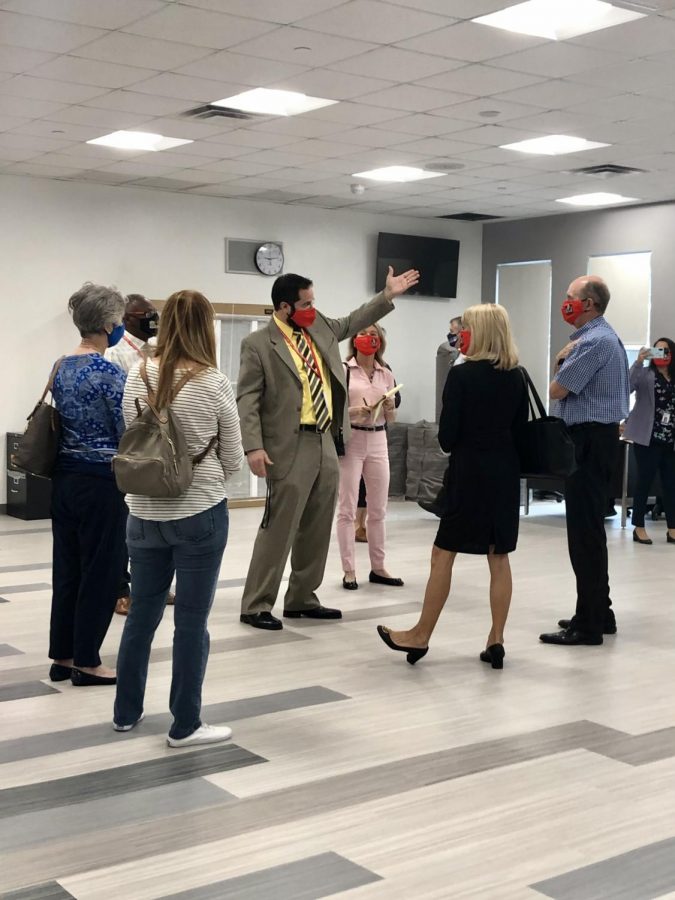 Mr.Ullivarri shows the brand new cafeteria to FOGH members and Mari Tere Rojas. 