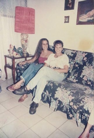 Two women wearing the popular styles of the 80s.