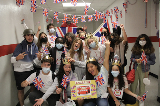 Students in the England group, alongside their student group leaders and teacher helpers, showing off their pride.