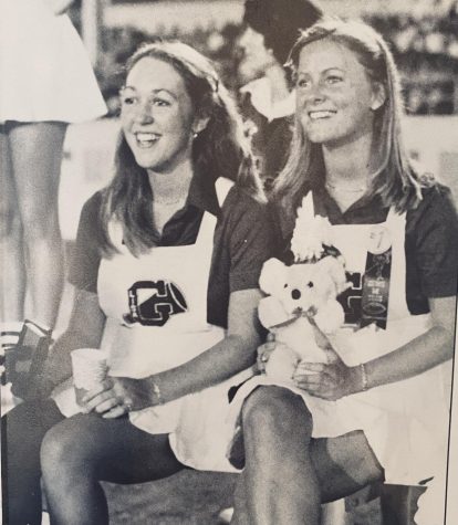 Wanting to make the most of her high school experience, Morris (right), joined numerous extracurriculars including cheerleading.