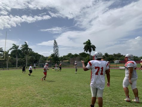 The Coral Gables Senior High football team running routine drills after school in preparation for their game on Aug. 27.