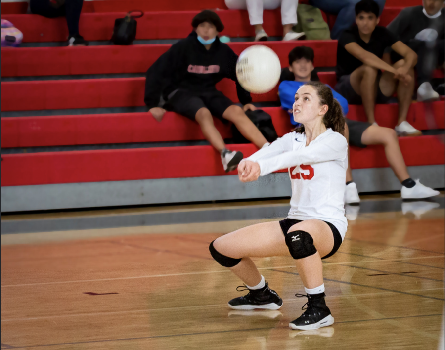 Georgia+Rau%2C+libero+for+the+girls+JV+Volleyball+team%2C+getting+in+position+to+hit+the+ball.