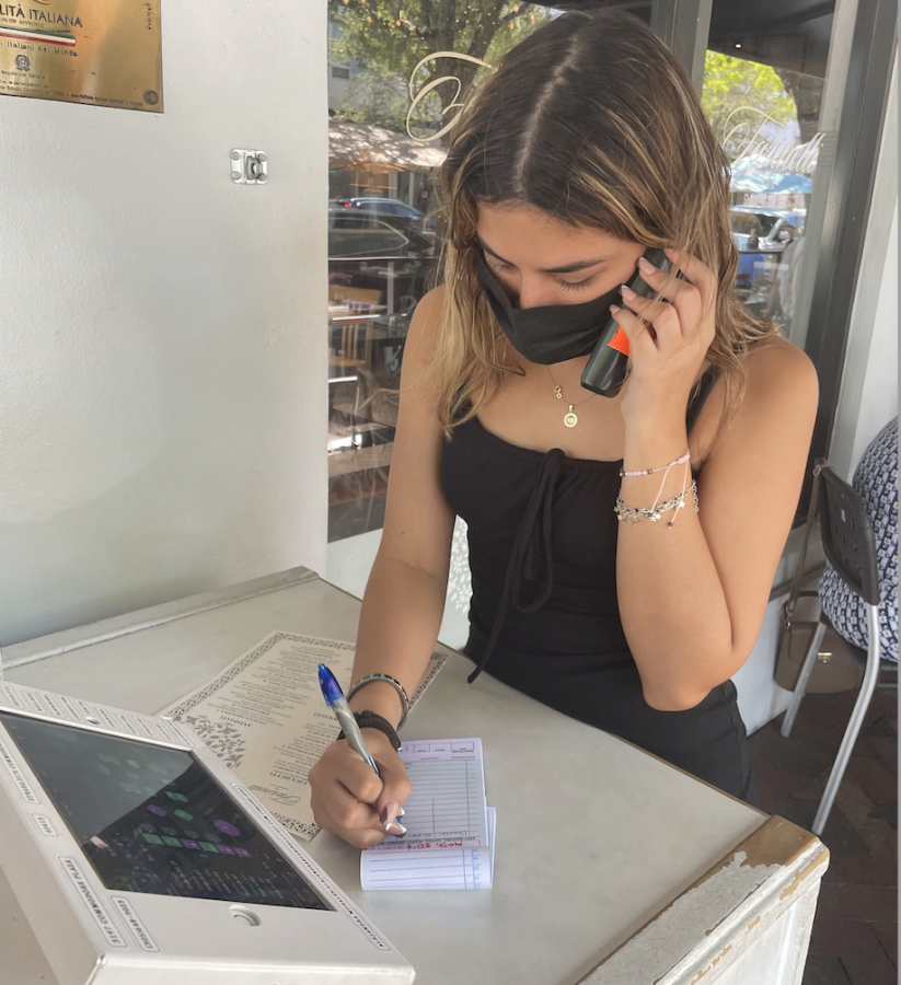 Scheduling+reservations+for+customers+is+a+task+Chacon+has+become+comfortable+with+because+her+communication+and+social+skills+have+improved+throughout+her+time+working+at+Farinelli+1937.