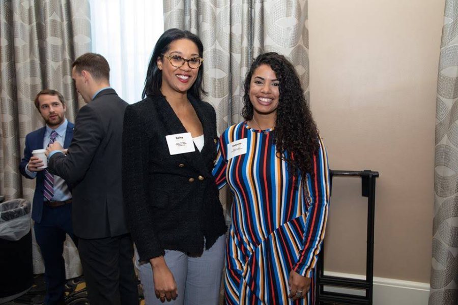 Mrs. Orbis, know around Gables as Ms. Lopez, stands proudly with one of her colleagues at a NAF event.