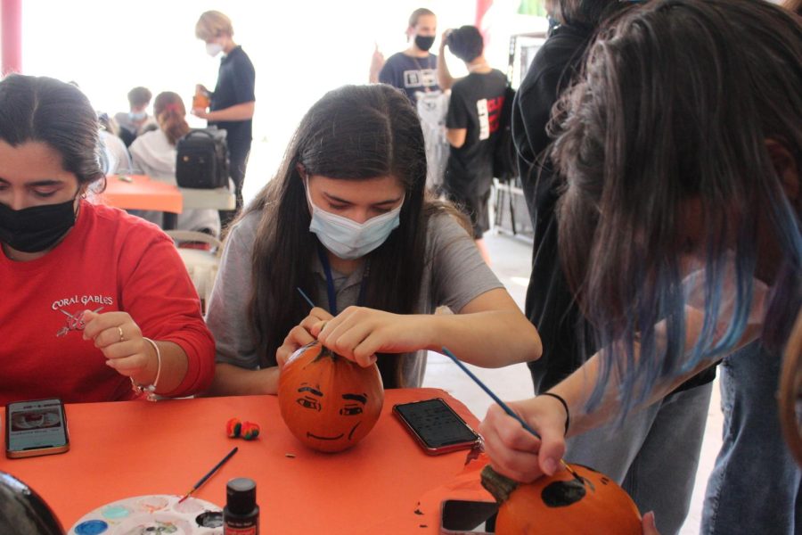 Many students worked hard on detailed painted pumpkin designs, straying from the carved-pumpkin norm.