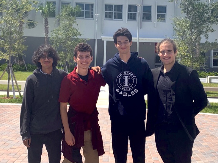The four National Merit Scholarship Program semifinalists, Jared O'Sullivan, Gabriel Wagner, Bernardo Andrade and Julian Mesa (left to right), stand together as they share their achievements.