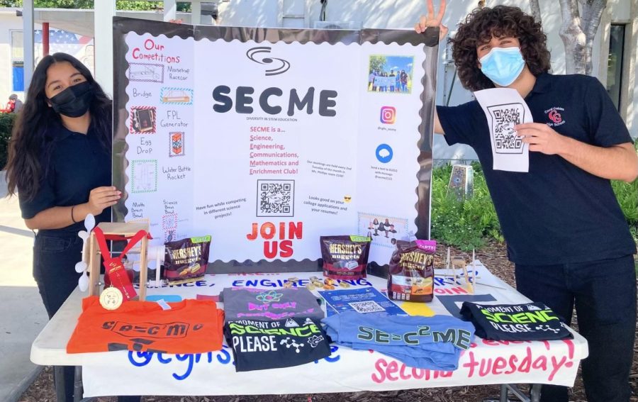 During Gables' Club Fair, SECME displayed their past club shirt designs in hopes of attracting possible future members.