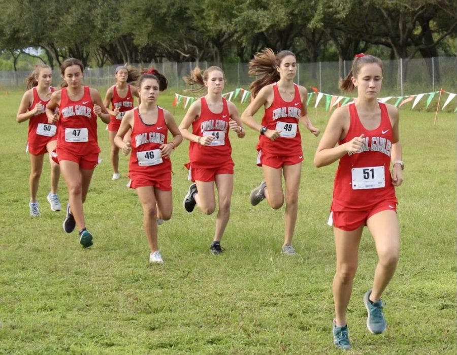 The girls varsity team warming up in order to prepare for one of their most important races: regionals.