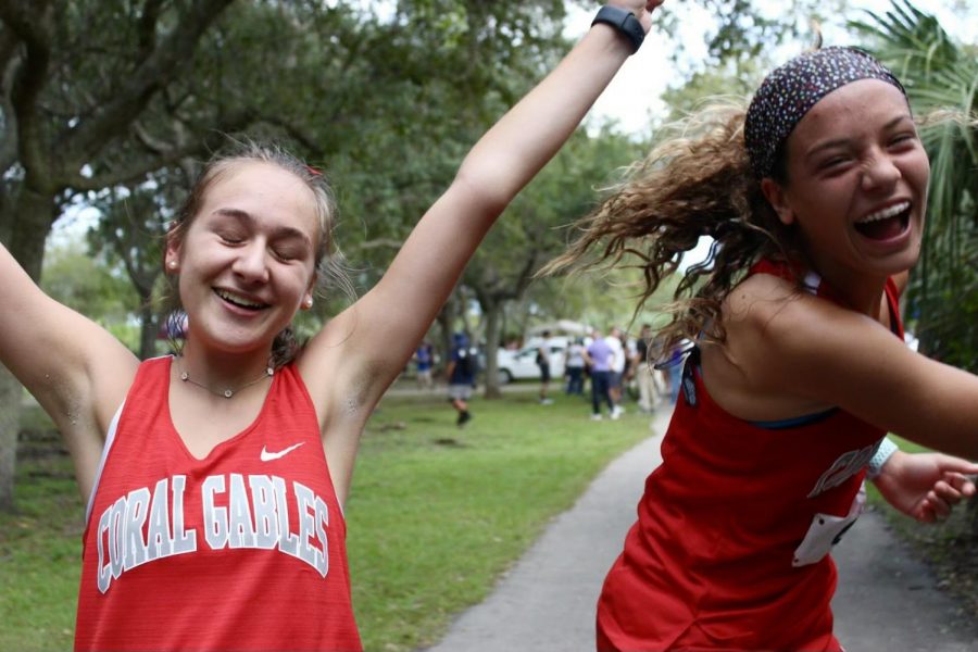 Runners+Catalina+Quinteros+and+Audrey+Simon+celebrate+their+achievement+at+regionals.