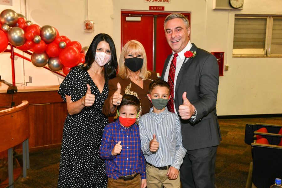 Standing with his wife, two young sons and Mari Tere Rojas, Yacoub celebrates his induction before the ceremony.