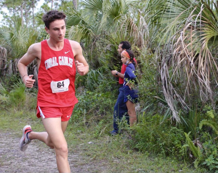 Senior Gregoire Winston while running his last race on the Gables cross country team.