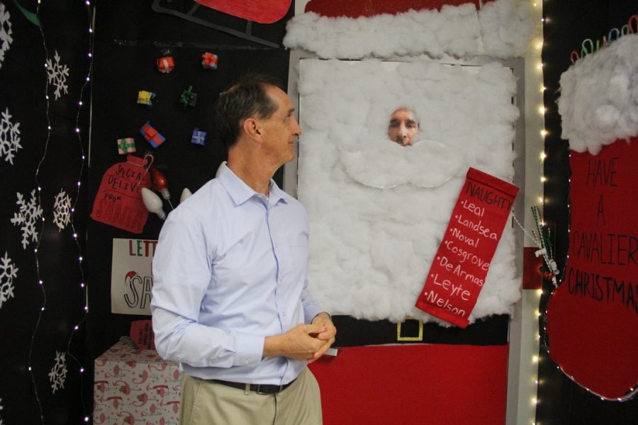Mr. Cipriani presents his Santa themed door to judges.