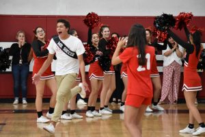 Senior, Etienne Montigny representing the boys soccer team. 