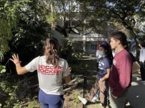 Co-founder of the Garden Project Lucia Chico instructing students on how the new garden will be built.